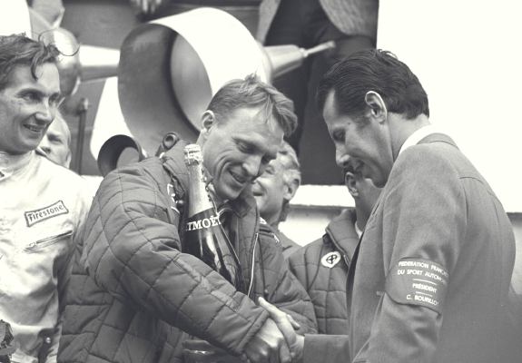 Dan Gurney accepted champagne